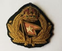 genuine/original white star line officers' cap badge
